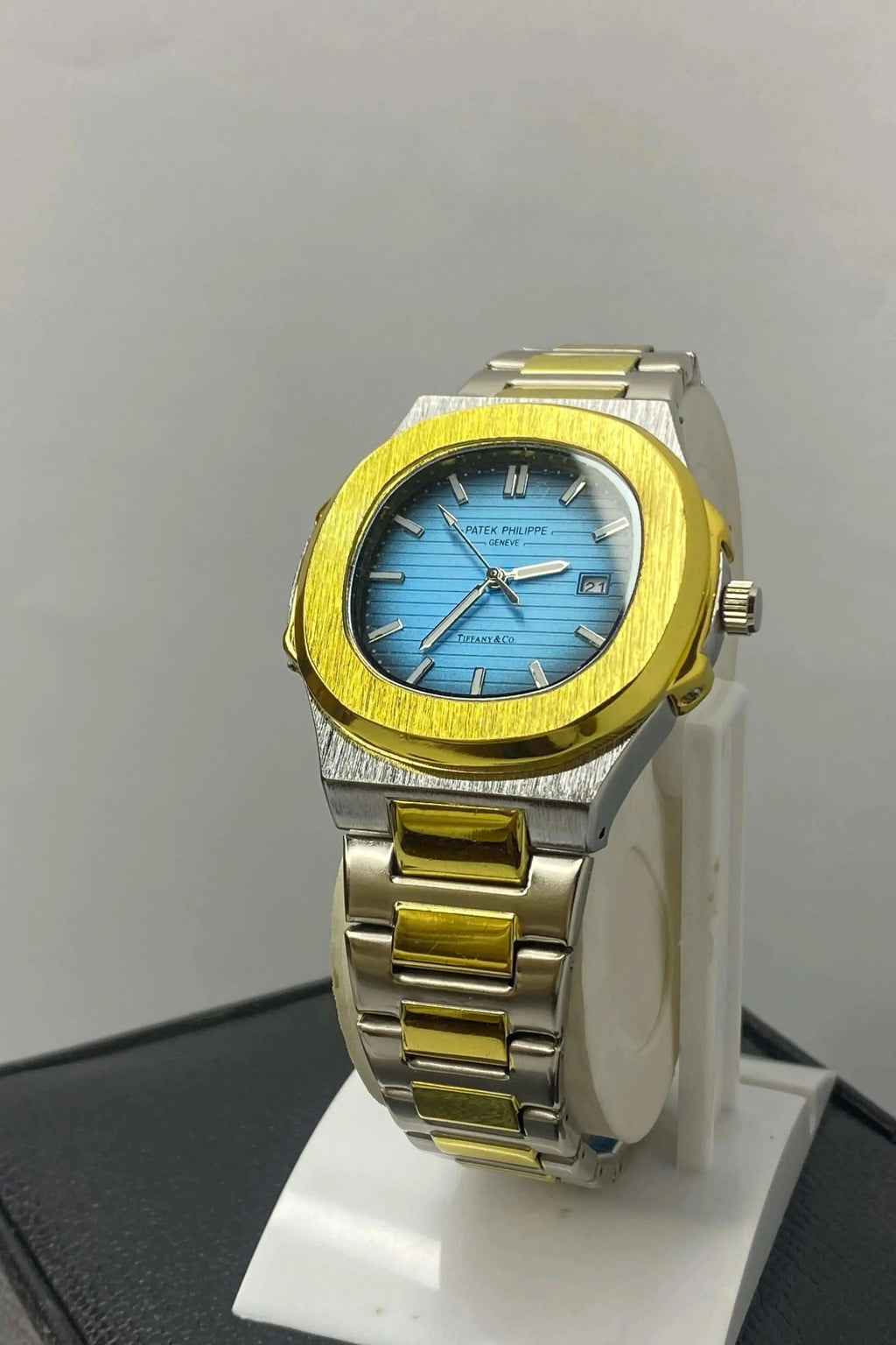 Close-up of Patek Philippe Geneve Thanaco Watch featuring detailed dial, luxury markers, and sub-dials.