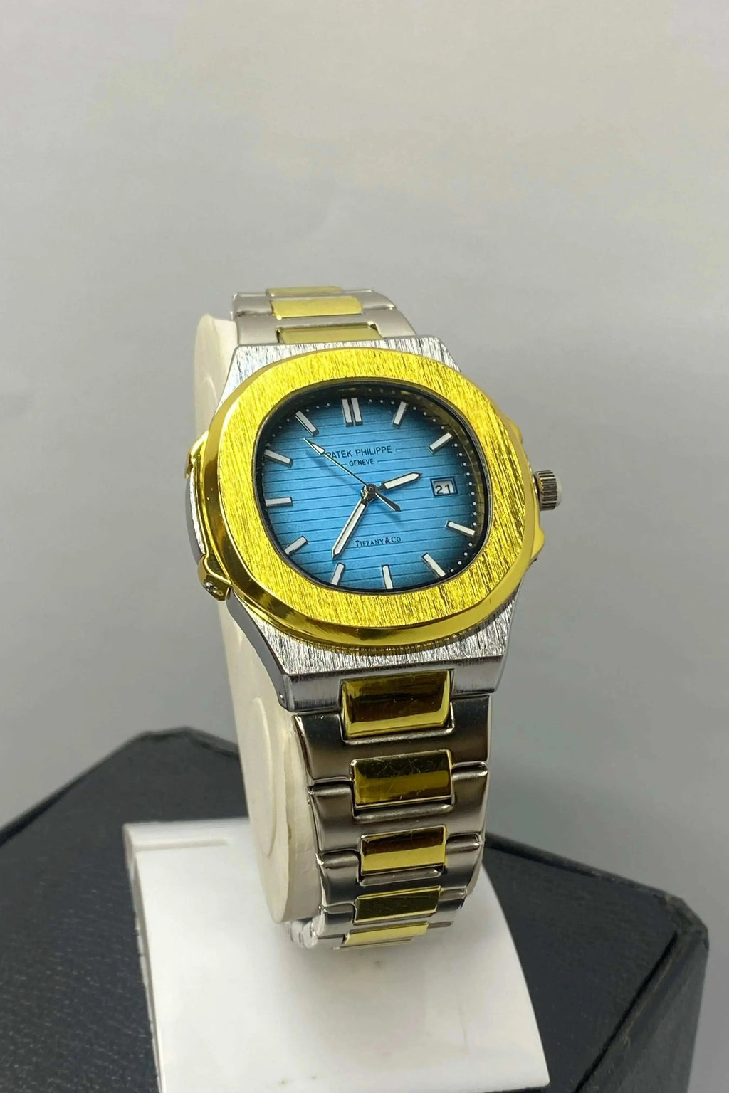 Patek Philippe Geneve Thanaco Watch with classic analog display, polished case, and elegant dial design.