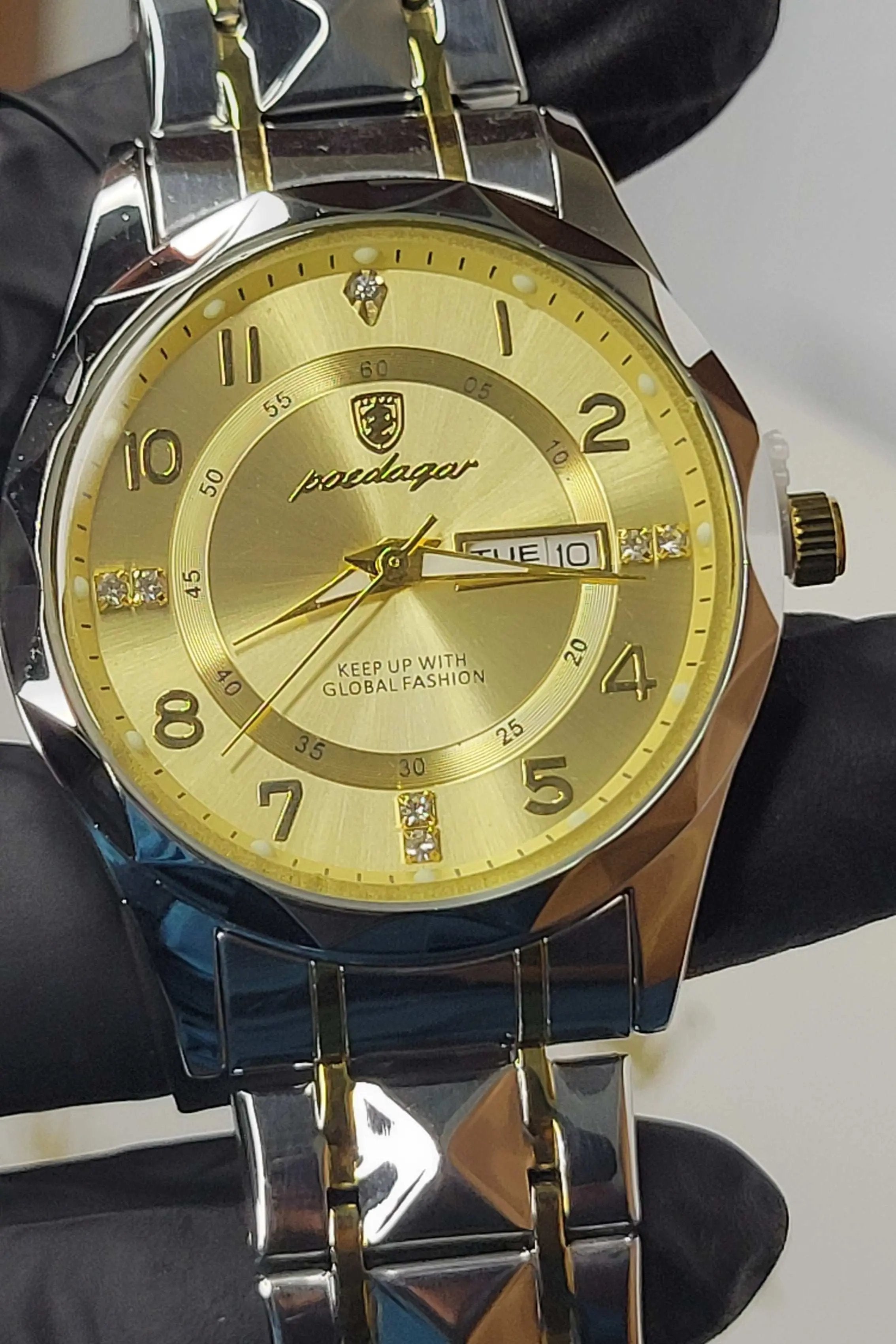 Poedagar men’s luxury watch with gold dial and date display close look