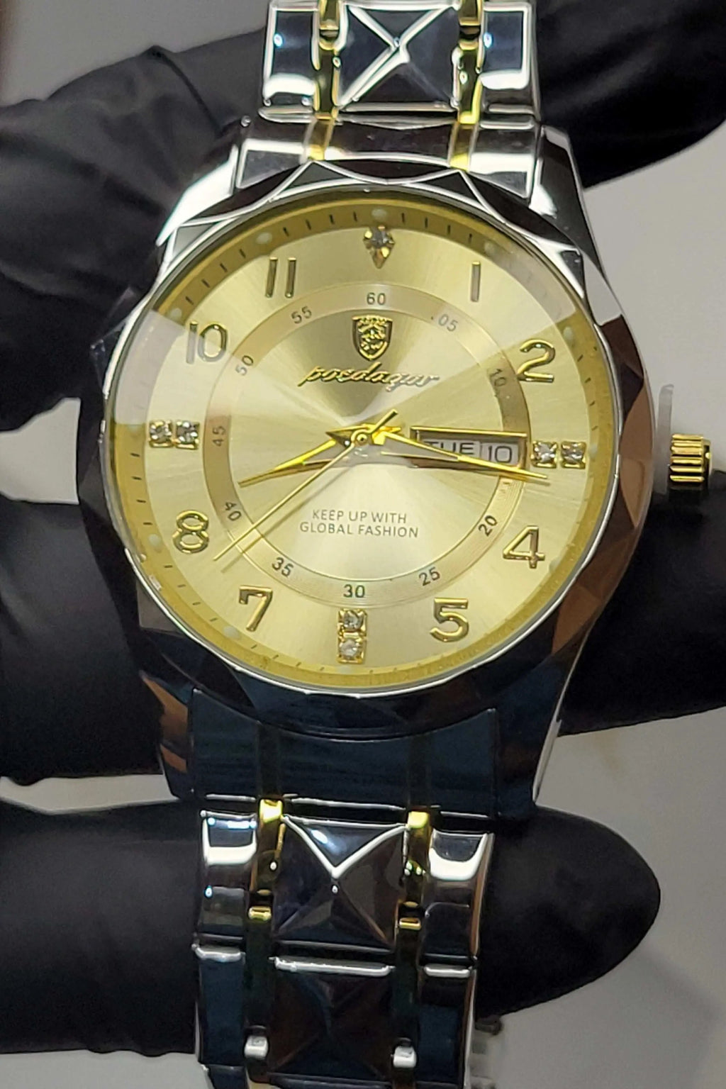 Poedagar men’s luxury watch with gold dial and date display dial closeup